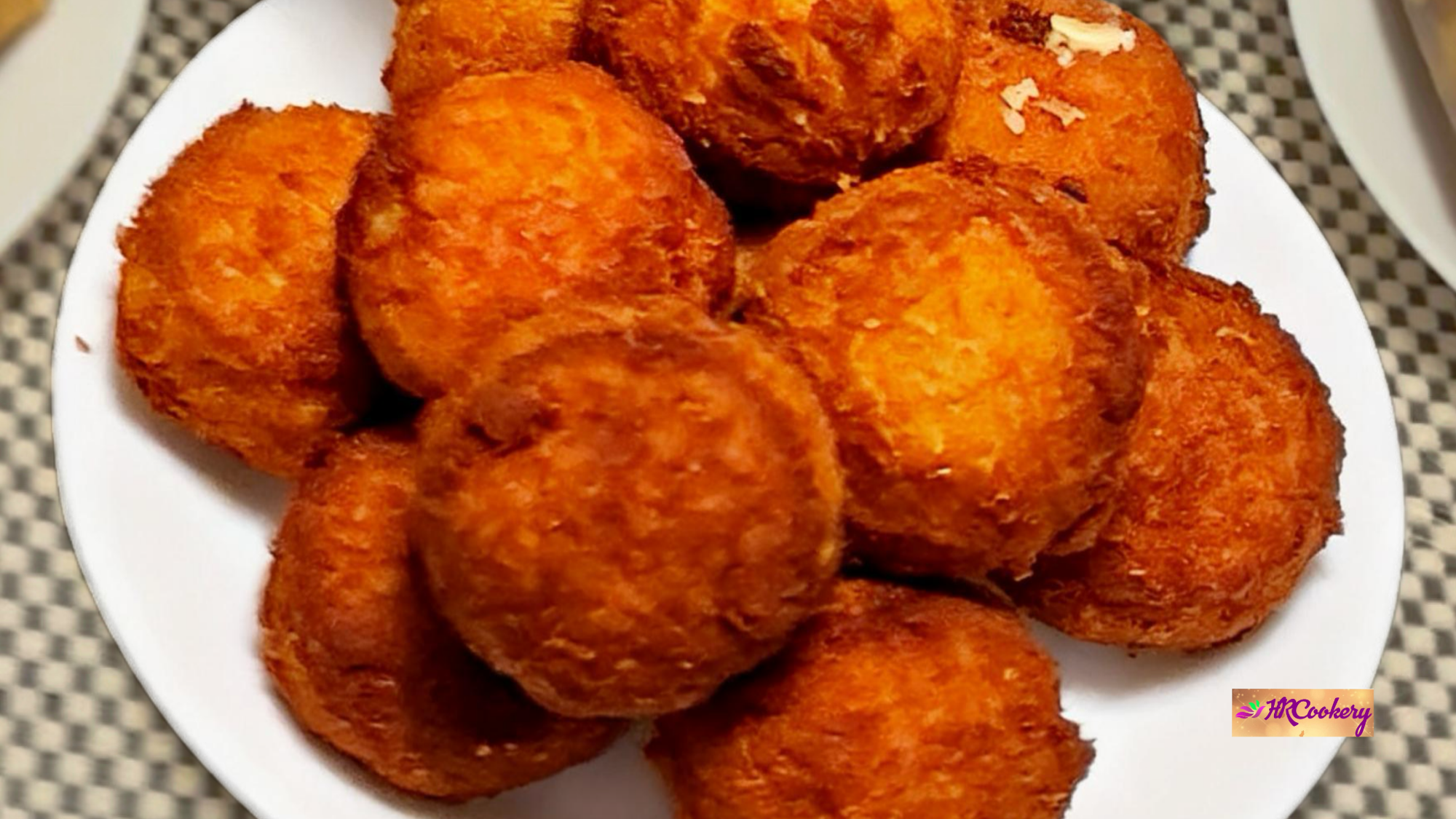 Crispy deep-fried chicken nuggets served on a plate, golden brown and crunchy.